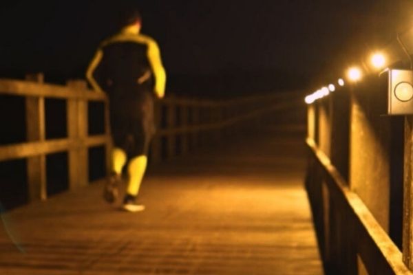 Skive Bridge LED lighting on wooden path bridge