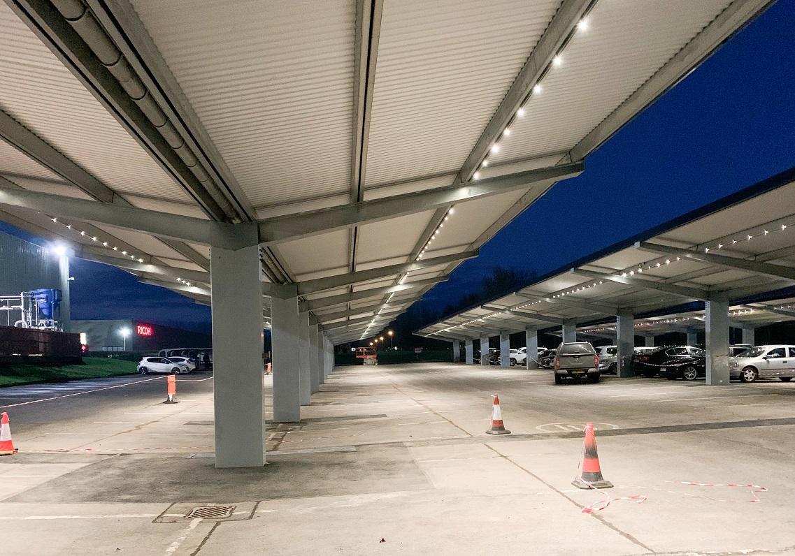 Solar carport and car park illuminated by linear led panel